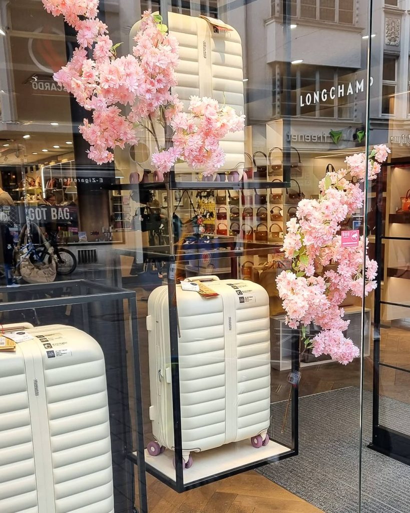 American Tourister Neovibe Puffer Koffer Hartschale Polycarbonat Sand Flieder Harenberg Bonn